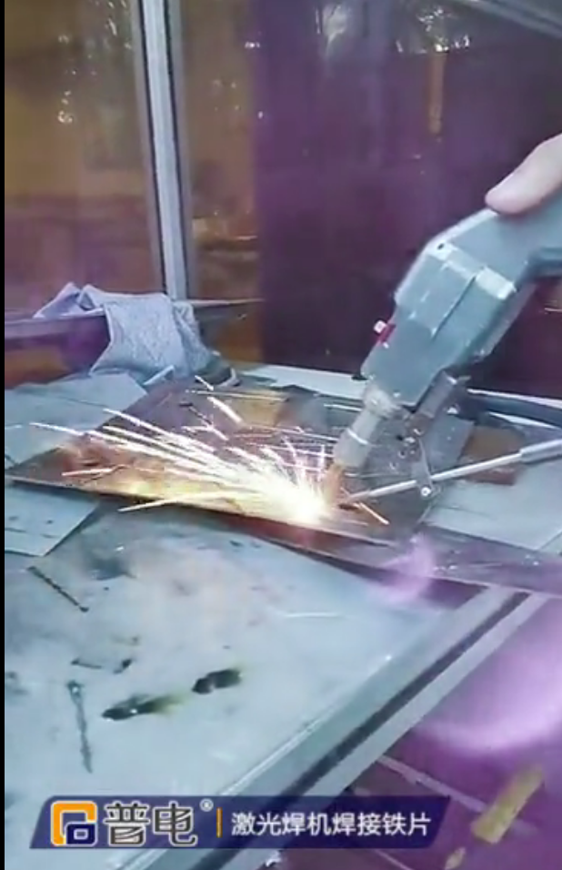 Welding of iron plate by laser welding machine